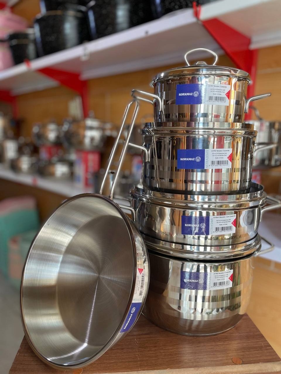 سرویس قابلمه کرکماز 1800 استیل ضد زنگ کفی چدن سه لایه درب پیرکس نشکن 9 پارچه بانه تجارت